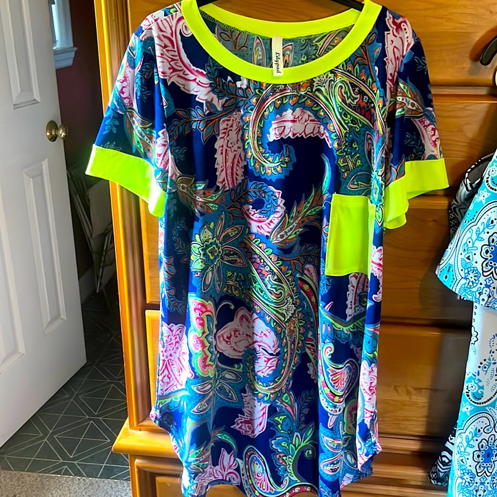 Medium brightly colored summer blouse.
